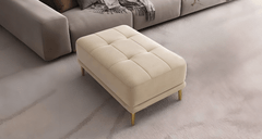 Estre's lounge chair with ottoman, redefining home comfort.