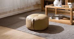 Decorative pouf ottoman, adding flair to spaces with Estre.